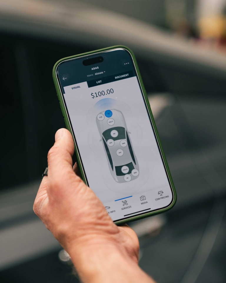 Mobile Tech RX ADAS screen on a phone, showing required calibrations on a vehicle diagram